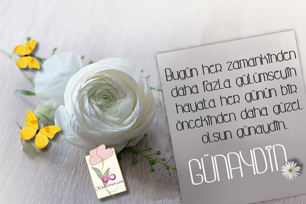 Çiçek desenli arka plan üzerinde günaydın yazısı